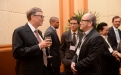 (L-R) Bill Gates, Co-Chair and Trustee, Bill & Melinda Gates Foundation, Founder, Microsoft; Ron Sim, Chairman & CEO, OSIM International